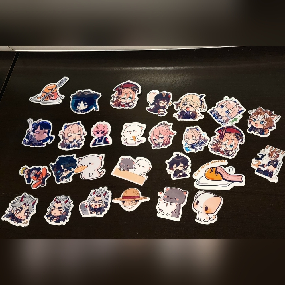 Lot of 28 laminated stickers